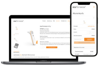 ein Laptop und ein Smartphone Screen zeigen den Earbreeze Shop